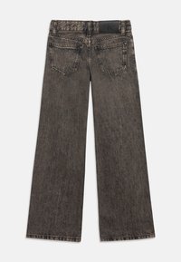 Black denim wide-leg jeans with a faded finish, featuring two back pockets and a waistband label. Smooth texture and straight cut design.