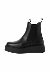 Black leather Chelsea boots with elastic side panels, pull tabs, and a thick platform sole. Smooth texture and rounded toe design.