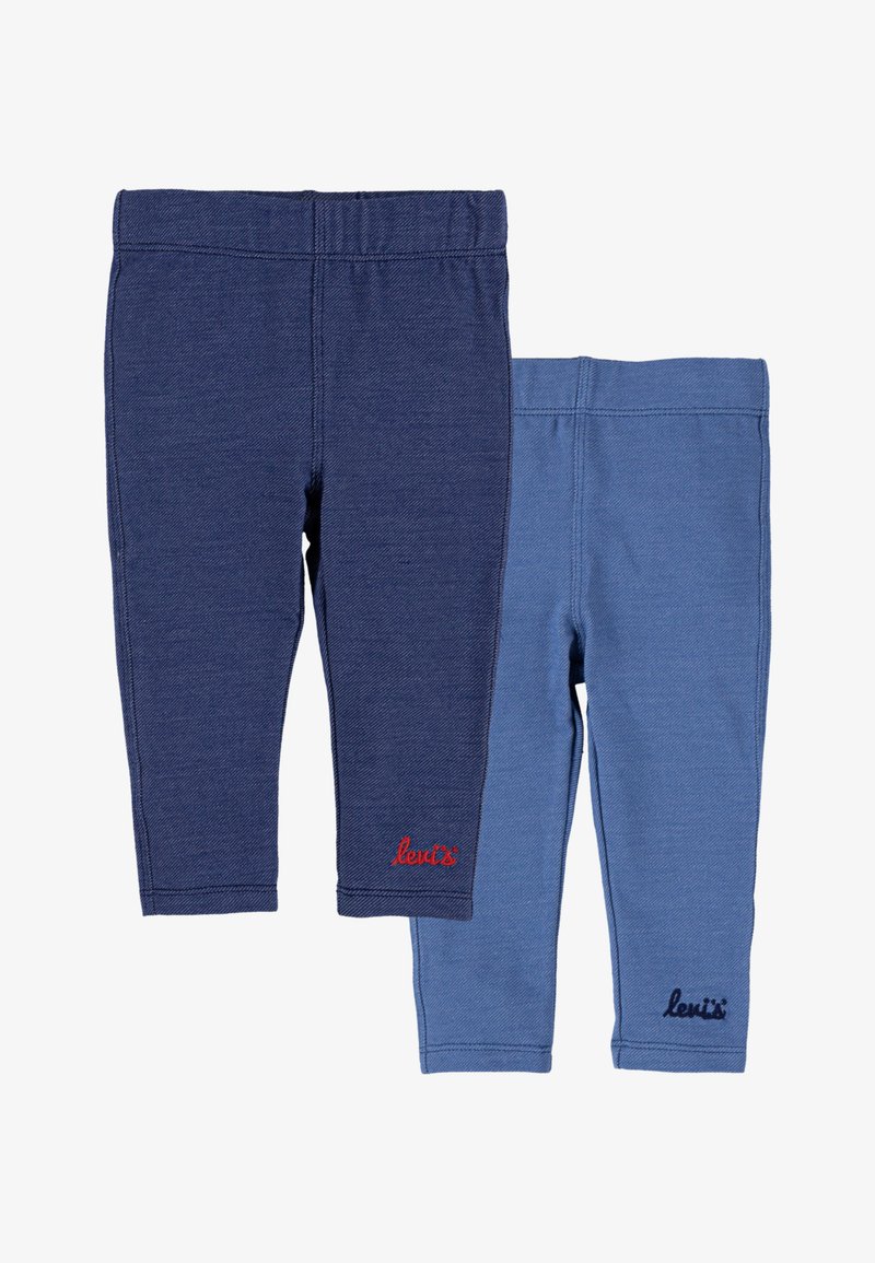 Duas pares de leggings elásticos em azul escuro e azul claro, com cinturas elásticas e logótipos da marca bordados em cores contrastantes.