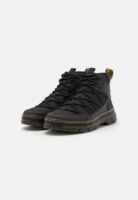 Dr. Martens Stivaletti stringati - black