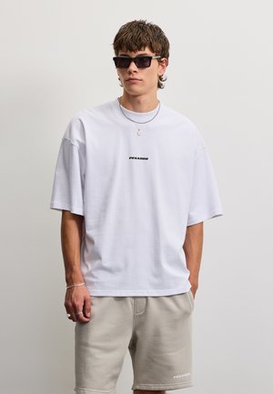 Pegador, LOGO BOXY TEE - T-Shirt basic - white/black gum