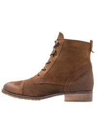 KIOMI Ankle boots brown Zalando