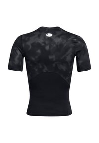 Zwarte sportshirt met korte mouwen, voorzien van een gestructureerd ontwerp en een aansluitende pasvorm. Under Armour-logo bij de nek en naadloze constructie.