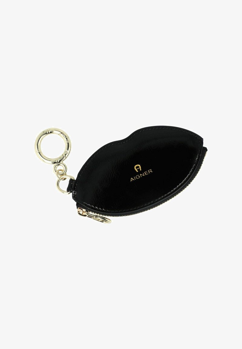 Black leather pouch with a zip closure, smooth texture, and a gold logo. Features a metallic keyring attachment on one side.
