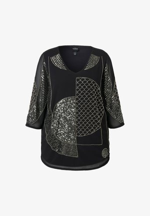 Black top with a V-neck and three-quarter sleeves featuring circular patterns, silver sequins, and textured embroidery accents.
