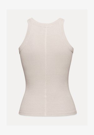 Tílko bez rukávů, pletené s žebrováním v světlé béžové barvě, se středovým švem na zádech a přiléhavým střihem.