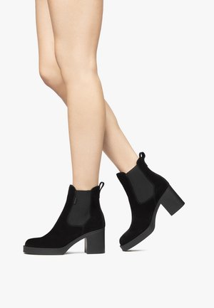 Platform ankle boots - nero