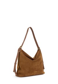 Suede shoulder bag in brown with a soft texture, featuring a slouchy design, a tan leather strap, and subtle gold hardware accents.