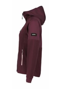 Veste à capuche bourgogne avec un design en matériaux mixte, dotée d'un haut lisse et d'un bas en polaire texturé. Comprend des poches zippées et un écusson de logo.