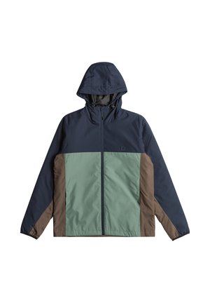 Hedged jacket met een ritssluiting aan de voorkant, voorzien van marineblauwe, groene en bruine panelen. Gemaakt van glad, duurzaam materiaal met elastische manchetten.
