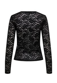 Μαύρο μακρυμάνικο τοπ με λουλουδάτο σχέδιο δαντέλας, ημιδιαφανές ύφασμα και εφαρμοστή μέση, εμφανιζόμενο από πίσω.