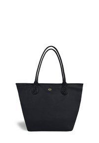 Black tote bag with textured leather material, woven accents on handles, a gold logo detail, and an open design for easy access.