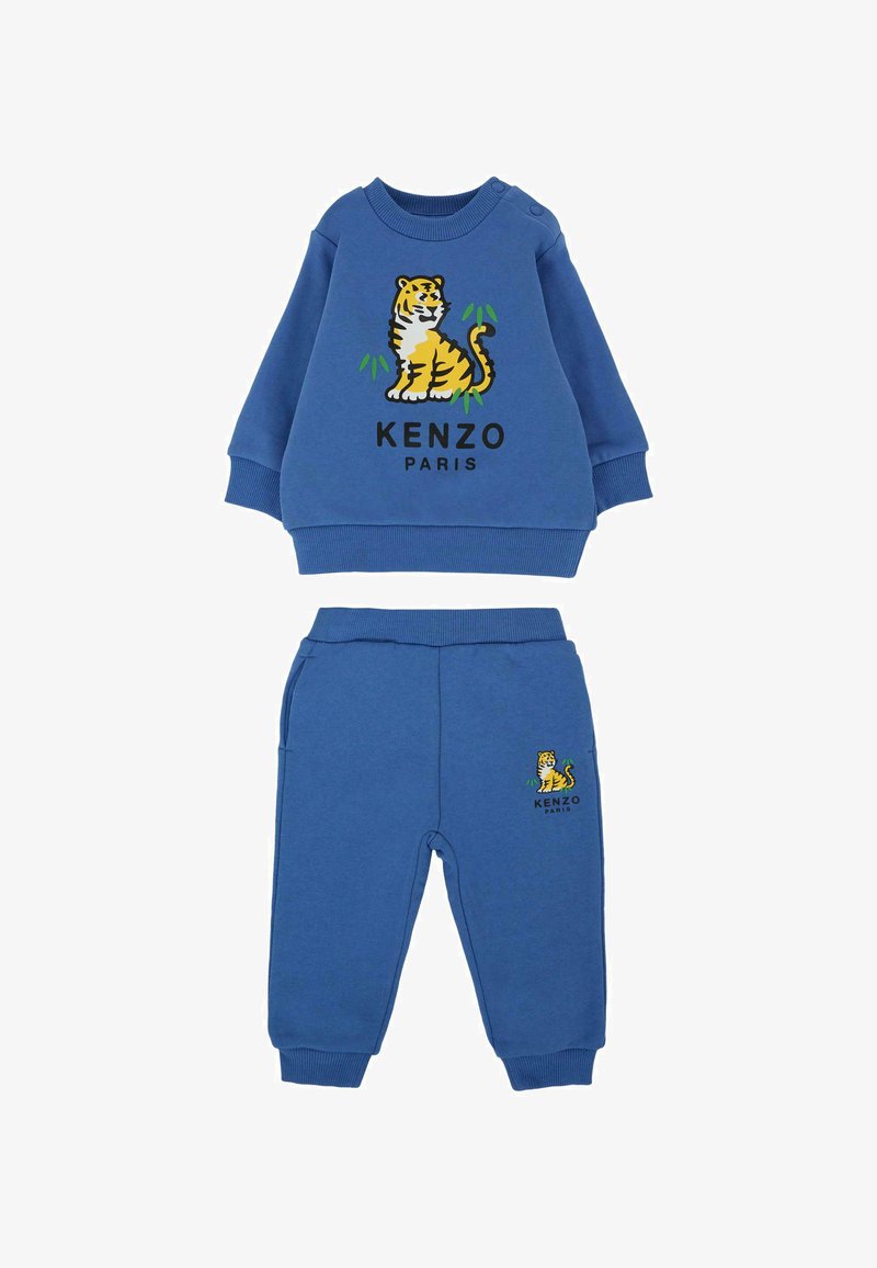 Set di felpa e pantaloni in cotone blu con grafica di una tigre sul davanti e la scritta "KENZO PARIS". Polsini e vita a coste.