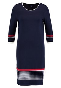 Robe bleu marine longueur genoux avec un col orné d'un liseré blanc, des rayures rouges et blanches sur les manches et l'ourlet, dotée de manches trois-quarts et d'une partie supérieure de la poitrine texturée.