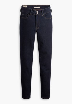 Jeans in denim blu scuro con vestibilità slim, dotati di due tasche anteriori, una tasca per le monetine e due tasche posteriori. Cuciture a contrasto e bottoni metallici.