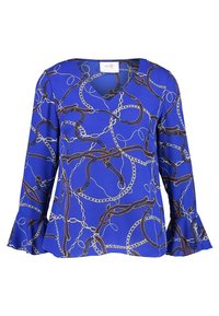 Modrá blůza s dlouhými roztřepenými rukávy, V výstřihem, zdobená řetězovým a provázkovým vzorem v hnědé a bílé barvě. Vyrobena z hladkého, lehkého materiálu.