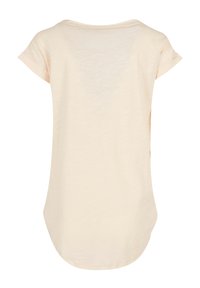 Light beige, short-sleeve top with a rounded neckline, curved hemline, and a soft, slightly textured fabric. Simple, casual design.