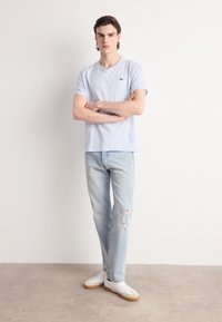 Lacoste Basic póló - bleu clair
