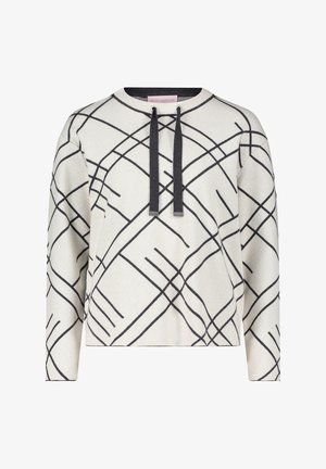 Crème sweater met zwarte geometrische lijnen, met een ronde halslijn en trekkoorden met zilverkleurige accenten. Zachte gebreide stof, iets cropped.