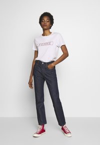 Levi's® 501® FOR WOMEN - Calças de ganga de perna direita - across a plane