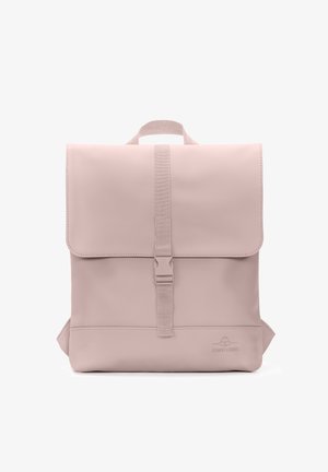 Light pink backpack with a flap closure, adjustable straps, and a front buckle. Made of smooth material featuring a minimal logo on the bottom.
