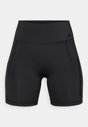 Čierne športové kraťasy z elastickej látky. Vysoký pás s dvoma bočnými vreckami a jemným logom na páse.