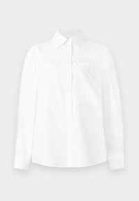Camicia bianca a maniche lunghe con colletto button-down, due tasche sul petto e taglio dritto. Realizzata in un tessuto leggero con una consistenza liscia.