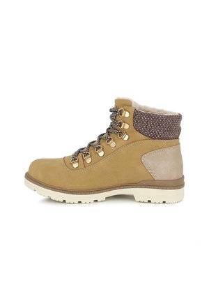 MIKA. - Bottes de neige - miel