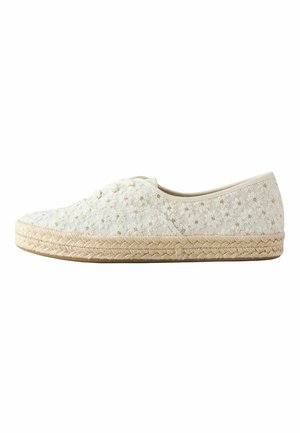 White lace-up espadrille with braided jute sole and small embroidered floral pattern on fabric upper.