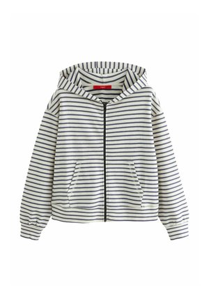 Haut à capuche rayé en crème et marine, avec fermeture éclair à l'avant, deux poches latérales, capuche avec cordon de serrage et poignets élastiques. Matière en coton doux.
