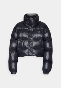 Veste matelassée noire brillante avec col montant haut, fermeture éclair frontale, poignets élastiques et logo HH sur le côté gauche de la poitrine.