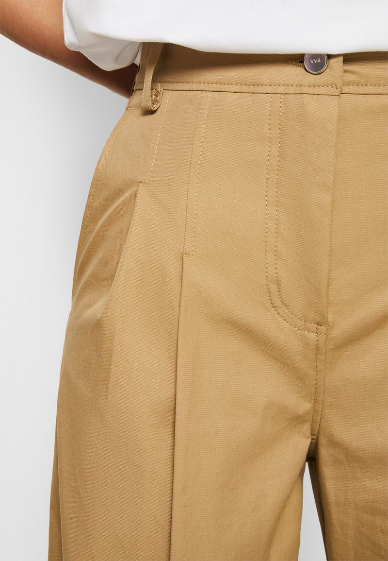 Damen Bekleidung | Victoria Victoria Beckham FLARED TROUSER Stoffhose sandstone/beige - FP57127 Damen Bekleidung | Victoria Victoria Beckham FLARED TROUSER Stoffhose sandstone/beige - FP57127