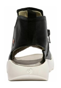 Schwarze Ledersandalen mit rückseitigem Reißverschluss, weißer Gummisohle, offenen Fersen, runder Form und strukturiertem Obermaterial. Verfügt über ein kleines dekoratives Element.