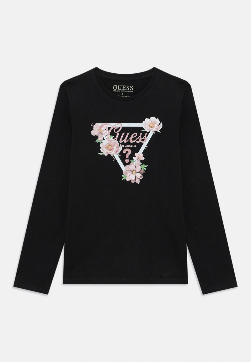 Melna krekla ar gariem piedurknēm ar ziedu motīvu, kurā ir gaiši rozā ziedi un triogonāla "Guess?" logo ar kontrastējošu baltu kontūru.