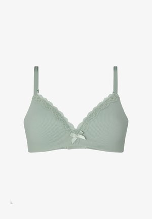 Soutien-gorge en tissu côtelé vert clair avec bordure en dentelle le long des bords supérieurs et un petit nœud décoratif au centre devant.
