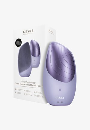Brosse faciale thermo sonique 6 en 1 Geske violette avec surface de nettoyage texturée, fonction chauffante et emballage présentant les détails du produit.