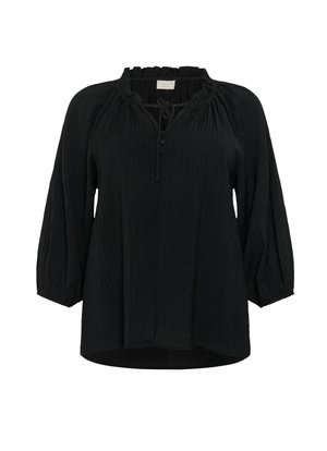 Black blouse with a textured finish, featuring a ruffled neckline, three-quarter puff sleeves, and a tie closure with buttons at the front.