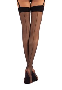 Calze autoreggenti nere fino alla coscia con un design trasparente, caratterizzate da una cucitura verticale sul retro e una parte superiore in pizzo di silicone per maggiore supporto.