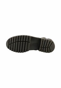 Suela de zapato de goma marrón con un patrón texturizado que presenta ranuras horizontales y verticales para mayor tracción. Diseño duradero y flexible.