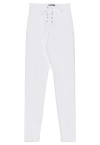 Vita leggings med hög midja, med snörning fram och sidofickor. Tillverkade av ett mjukt, stretchigt tyg för en figurnära silhuett.