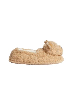 Beiger Plüschschuh mit strukturiertem Äußeren, abgerundeter Zehenpartie und einem weichen Bärenmotiv auf der Vorderseite. Das Innere ist mit flauschigem Material ausgekleidet.