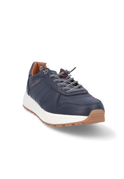 Zapatilla azul marino con parte superior de cuero texturizado, cordones plateados, collar acolchado en el tobillo y media suela blanca. Cuenta con una suela de goma color chicle.