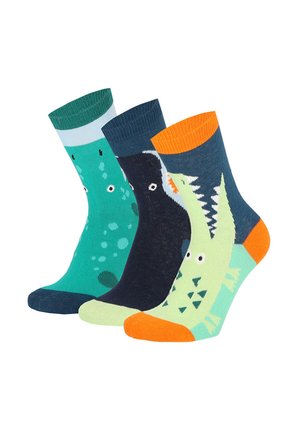 Drei bunte Knöchelsocken mit verspielten Dinosaurier-Designs in Grün, Marine, Türkis und orangefarbenen Akzenten, die überlappend auf weißem Hintergrund angeordnet sind.