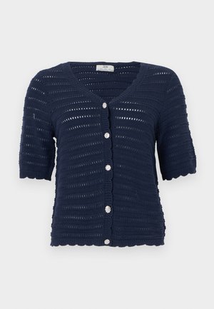 Cardigan court à manches courtes en maille bleu marine avec des rayures horizontales ajourées et cinq boutons ronds scintillants sur le devant.