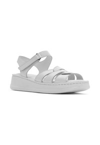 Witte leren sandalen met een verstelbare enkelriem, open teen ontwerp en een gestructureerde witte plateauzool met subtiele stikdetails.