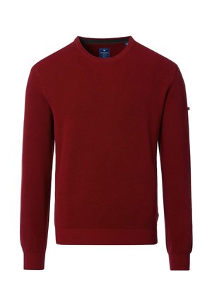 Roter gestrickter Pullover mit rundem Ausschnitt, strukturiertem Muster und gerippten Bündchen. Mit seitlichen Schlitzen für mehr Bewegungsfreiheit, ausgestattet mit einem dezenten Logo auf dem Ärmel.