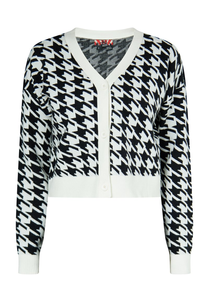 Cardigan scurt cu model houndstooth, alb-negru. Prezintă un decolteu adânc în V, închidere cu nasturi și manșete și tiv cu dantelă.