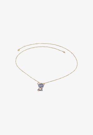 Collana d'oro con un pendente a forma di orsetto decorato con gemme blu, sospesa a una delicata catena texturizzata.