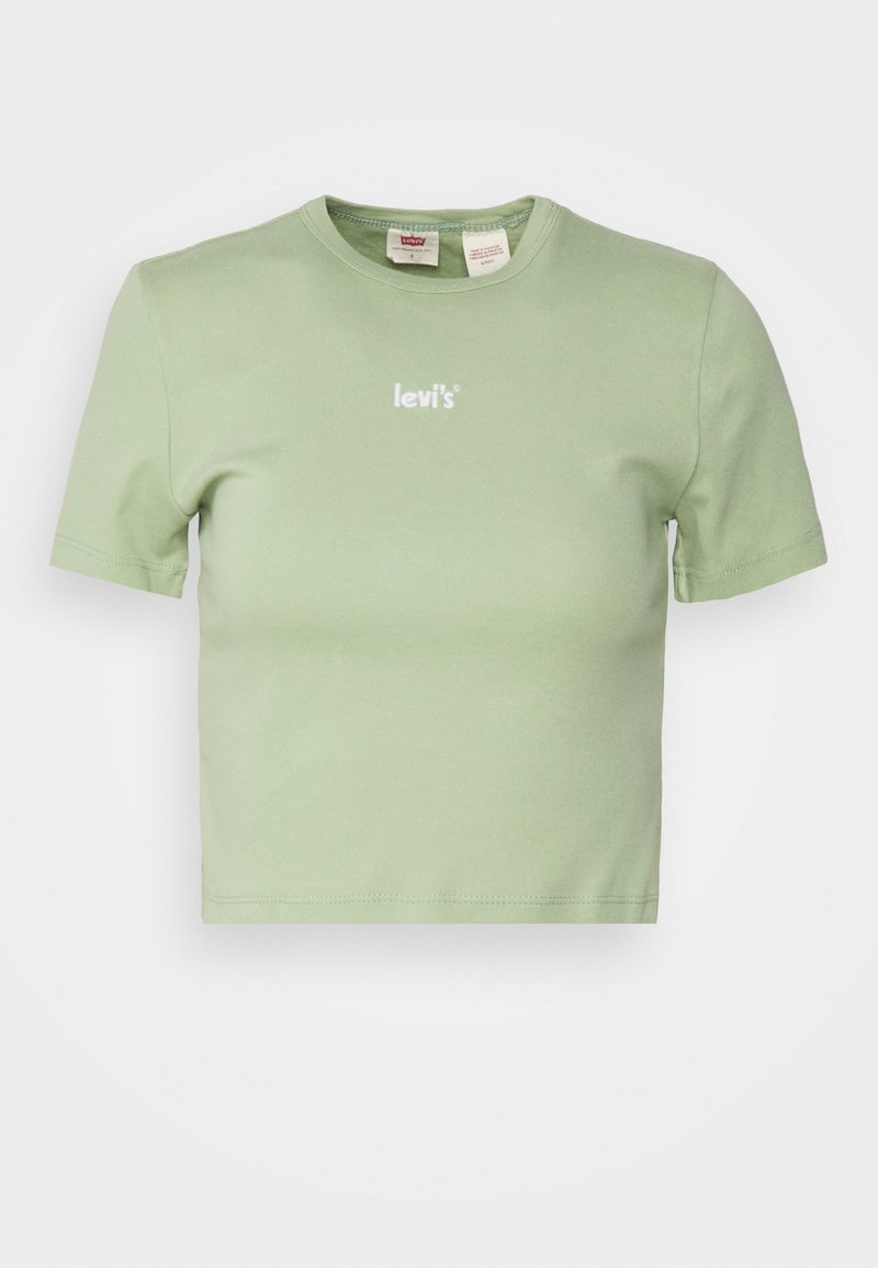 T-shirt cropped vert clair en coton, avec un col rond et des manches courtes. L'avant présente un logo "levi's" en blanc.