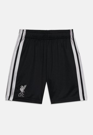 Čierne futbalové šortky Liverpool s bielymi bočnými pruhmi a logom L.F.C. na ľavej nohe, viditeľný elastický pás.